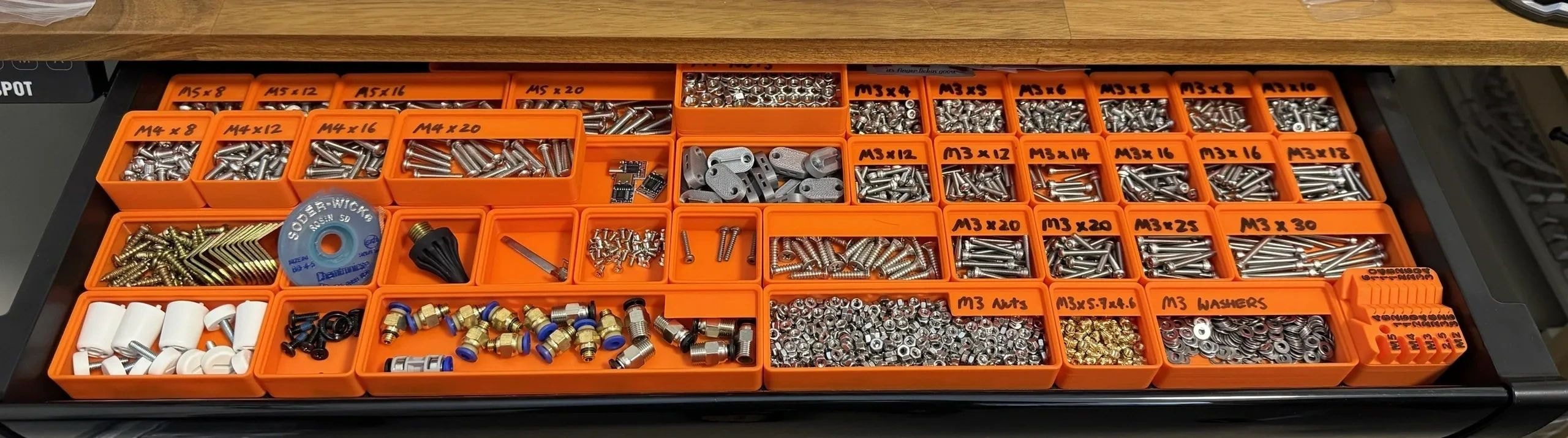 Organized hardware storage with labelled compartments